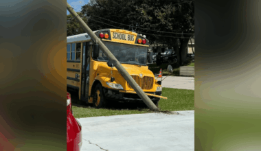 School bus carrying Centennial High students crashes into utility pole