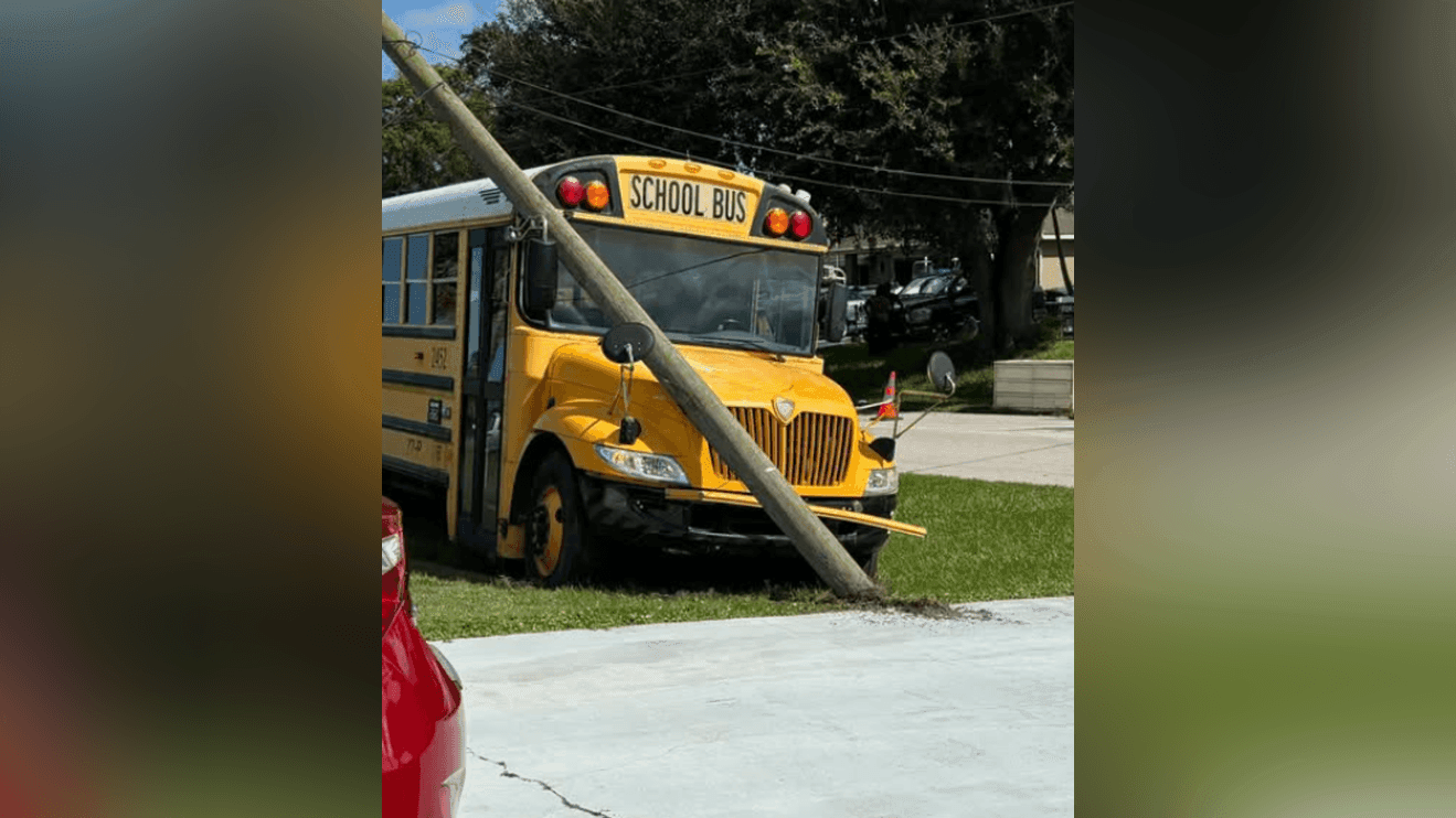 School bus carrying Centennial High students crashes into utility pole