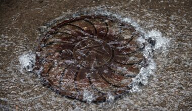 Water flowing out of a manhole.