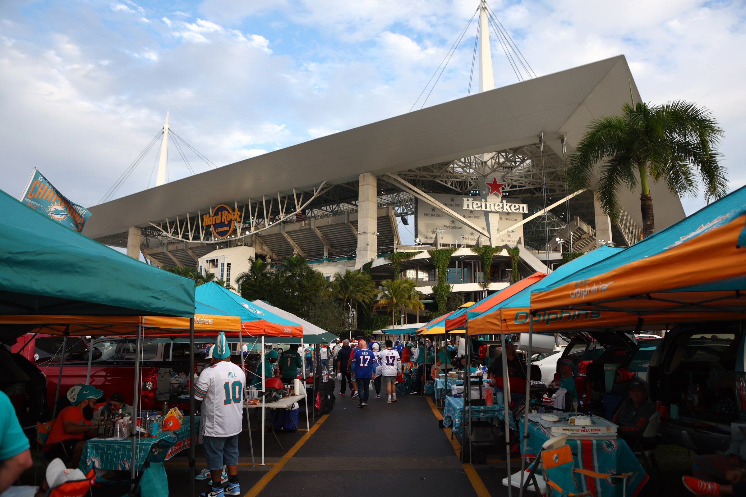 MIAMI GARDENS, FLORIDA - JANUARY 07: Fans tailgate prior to a game between the Buffalo Bills and the Miami Dolphins at Hard Rock Stadium on January 07, 2024 in Miami Gardens, Florida. (Photo by Megan Briggs/Getty Images)
