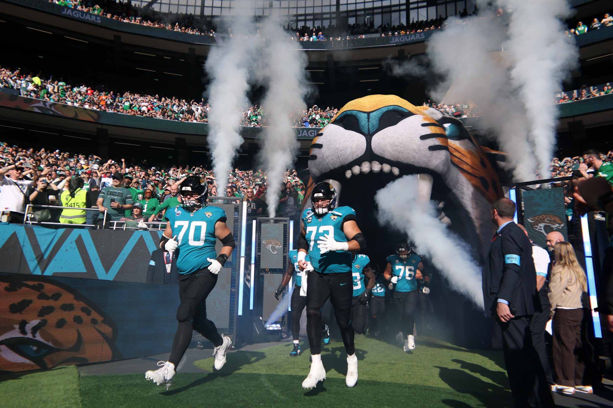 LONDON, ENGLAND - OCTOBER 11: Cole Van Lanen and Walker Little of the Jacksonville Jaguars come out of the tunnel before the 2026 NFL London Games match between Philadelphia Eagles and Jacksonville Jaguars at Tottenham Hotspur Stadium on October 11, 2026 in London, England. (Photo by Ryan Pierse/Getty Images)