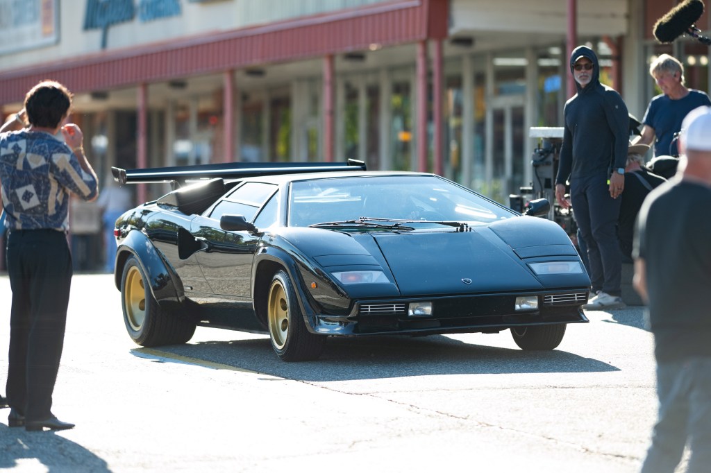 Austin Butler on the set of the Miami Vice reboot film at a New Jersey liquor store.