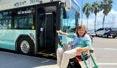 A person getting on a PSTA bus