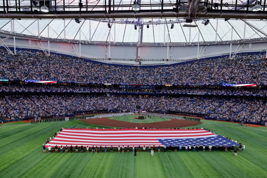 People celebrating at a Rays playoff game