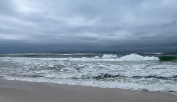 Rough surf ahead of Hurricane Isaias along the Gulf Coast.