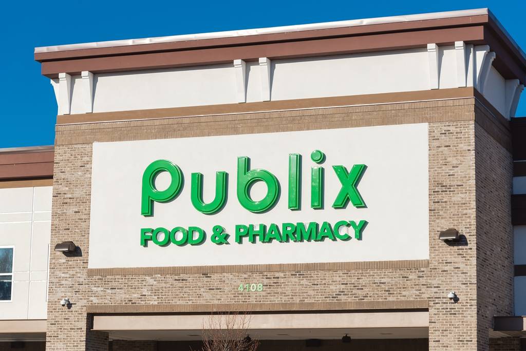 Close up logo of Publix Food Pharmacy at façade entrance