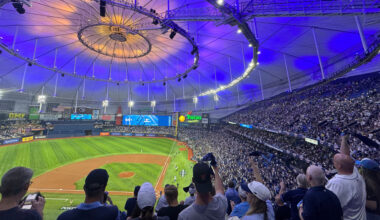 People celebrating at a Rays playoff game
