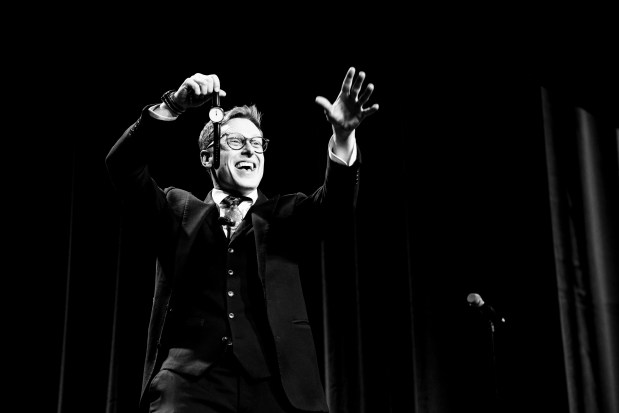 During his newest performance, ""CON MAN: A True Crime Magic Show," Ben Seidman explores the intersection between magic and con. (Ben Seidman/Courtesy)