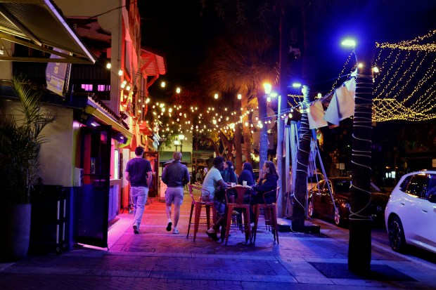 Bars in Himmarshee Village line the street in downtown Fort Lauderdale on Jan. 20, 2026. City commissioners say they are ready to tighten rules for the entertainment zone after a mass shooting in December and street fight in March. (Mike Stocker/South Florida Sun Sentinel)