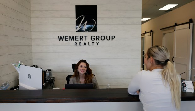 Office administrator/Listing Assistant Giana Hill at the lobby of the Wemert Group Realty, one of the 2026 Top Workplaces in Central Florida, on Tuesday, September 22, 2026. (Ricardo Ramirez Buxeda/ Orlando Sentinel)