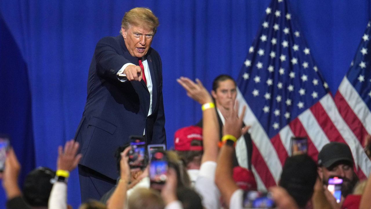 President Donald Trump gestures at a campaign rally at the Covelli Centre, in Youngstown, Ohio, Monday, Oct. 12, 2026. (AP Photo/Gene J. Puskar)