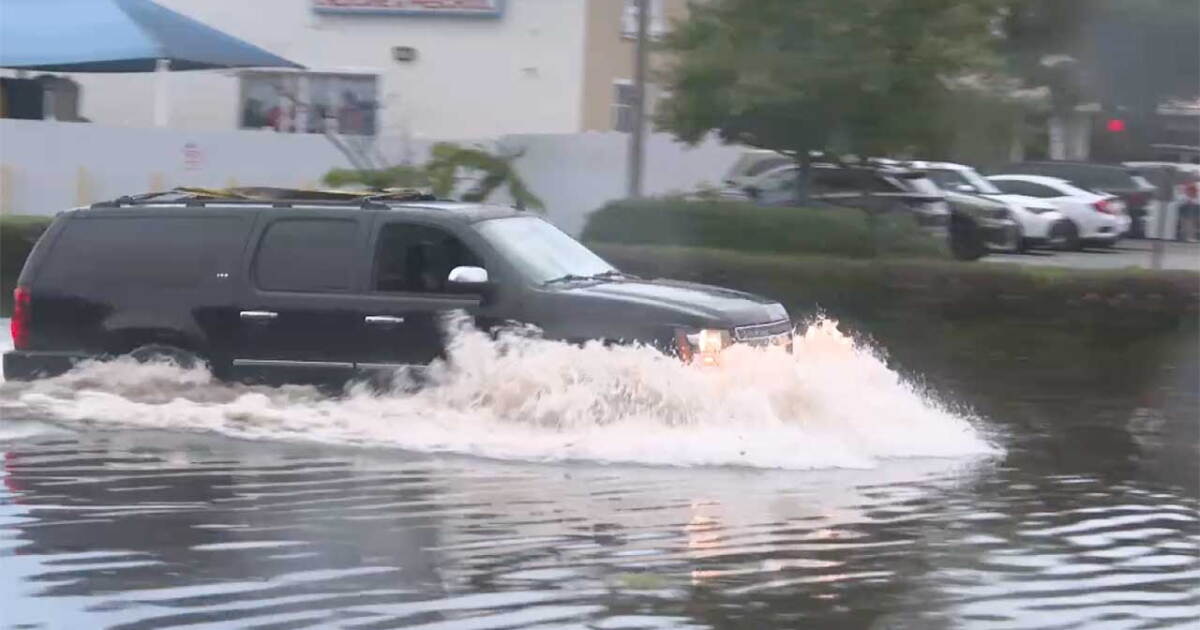 What's causing 'ongoing' flooding issues at this intersection?