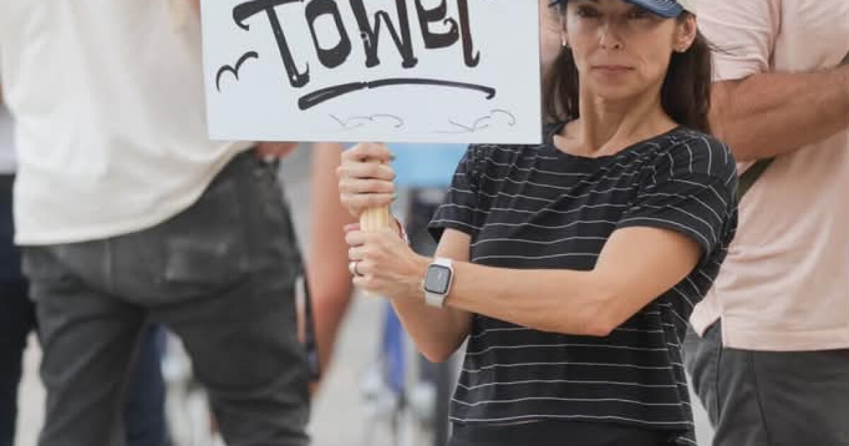 Local activists rally at historic Freedom Tower against Trump Presidential Library development