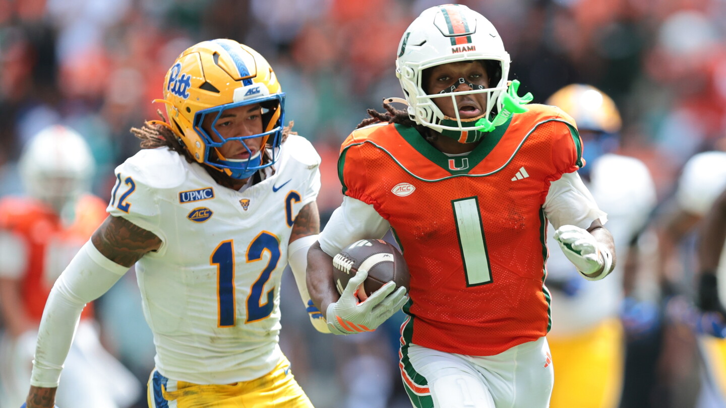 No. 1 Miami rolls past Pitt 52-23 behind Toney's historic performance