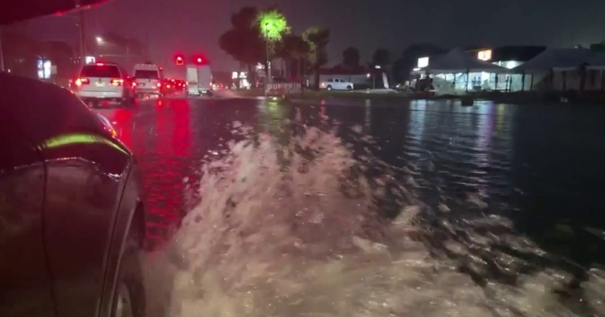 Heavy rain floods Central Florida as rescue crews deploy to Panhandle ahead of Hurricane Isaias
