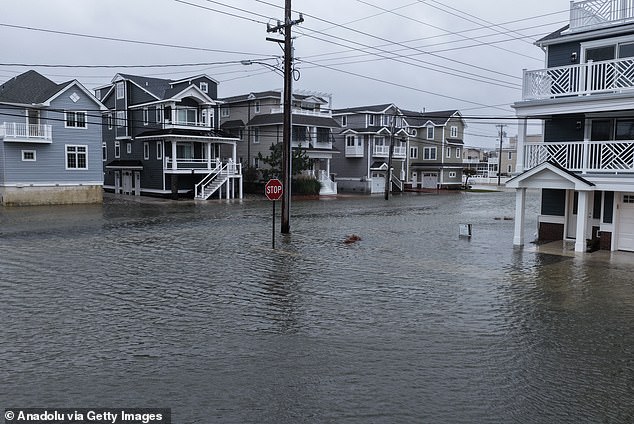 Video in Avalon saw large waves battering New Jersey and lapping over the Townsends Inlet Bridge, as well as streets submerged by the rising water levels