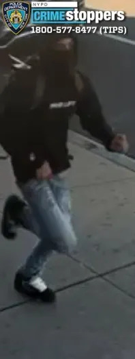 Suspect No. 11: He was last seen wearing a black sweater, blue pants, black sneakers and a black face mask. (Credit: DCPI)