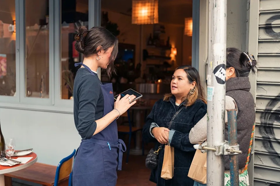 Remo and Fong get their turn at one of the coveted Ha’s Snack Bar tables. Stefano Giovannini
