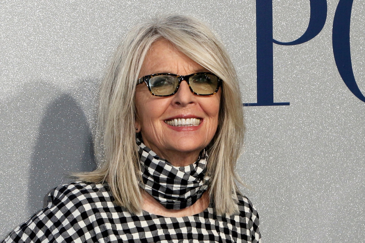 Diane Keaton smiles in a close-up photograph