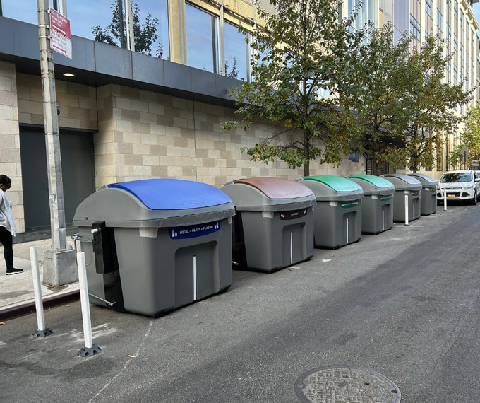 Some of the new trash container bins that the NYC Dept. of Sanitation recently installed around Community Board 2. Photo courtesy of DSNY