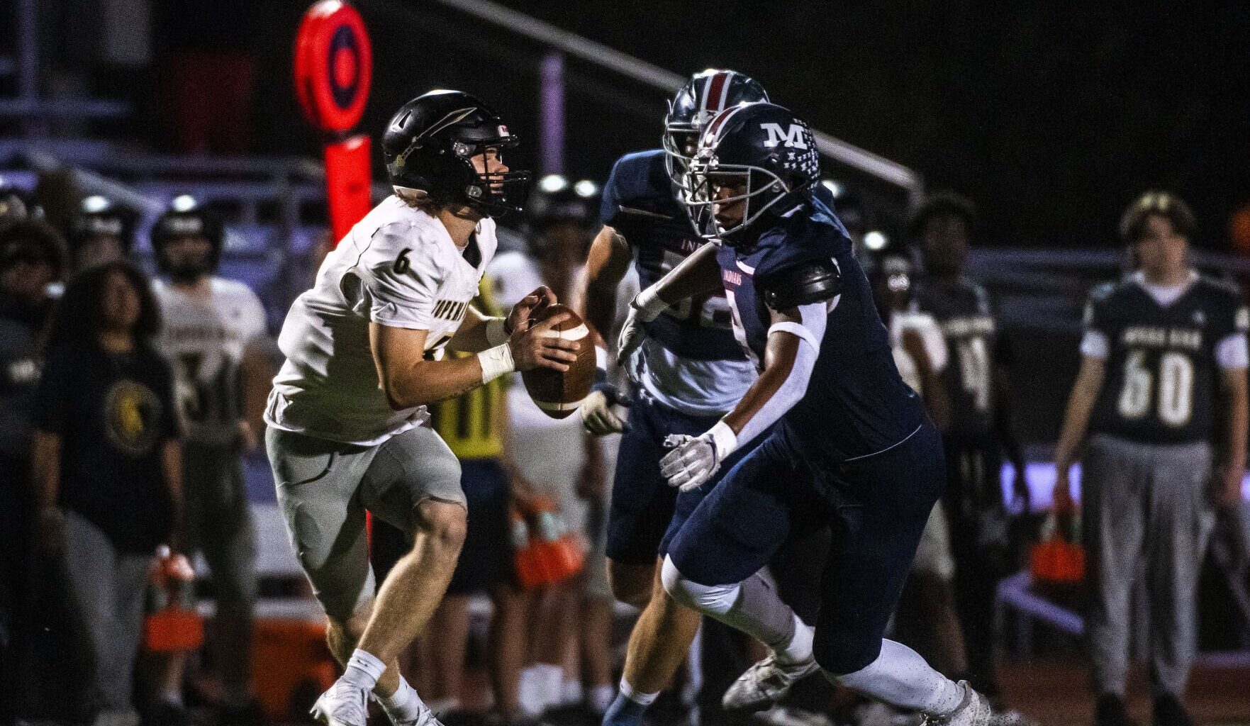 Manhattan High football cruises to Senior Night win over Topeka High