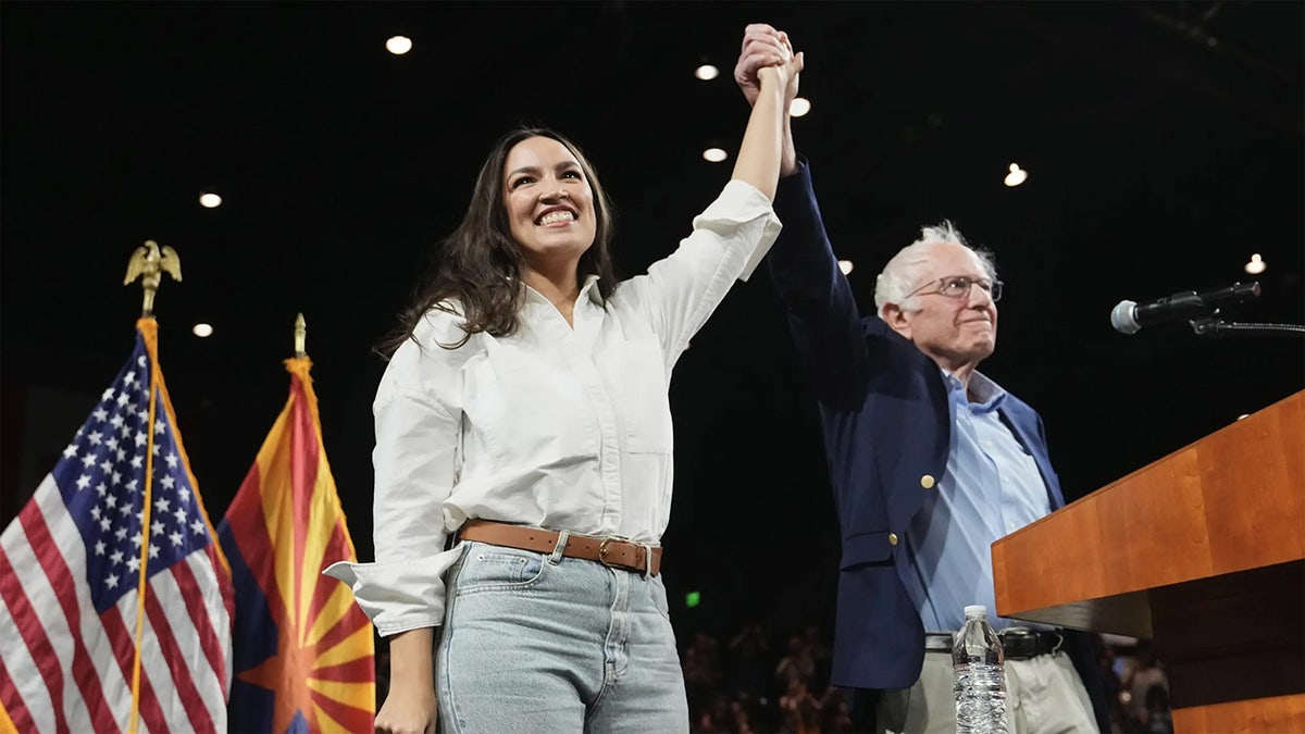 Bernie Sanders and Alexandria Ocasio-Cortez appear at a rally