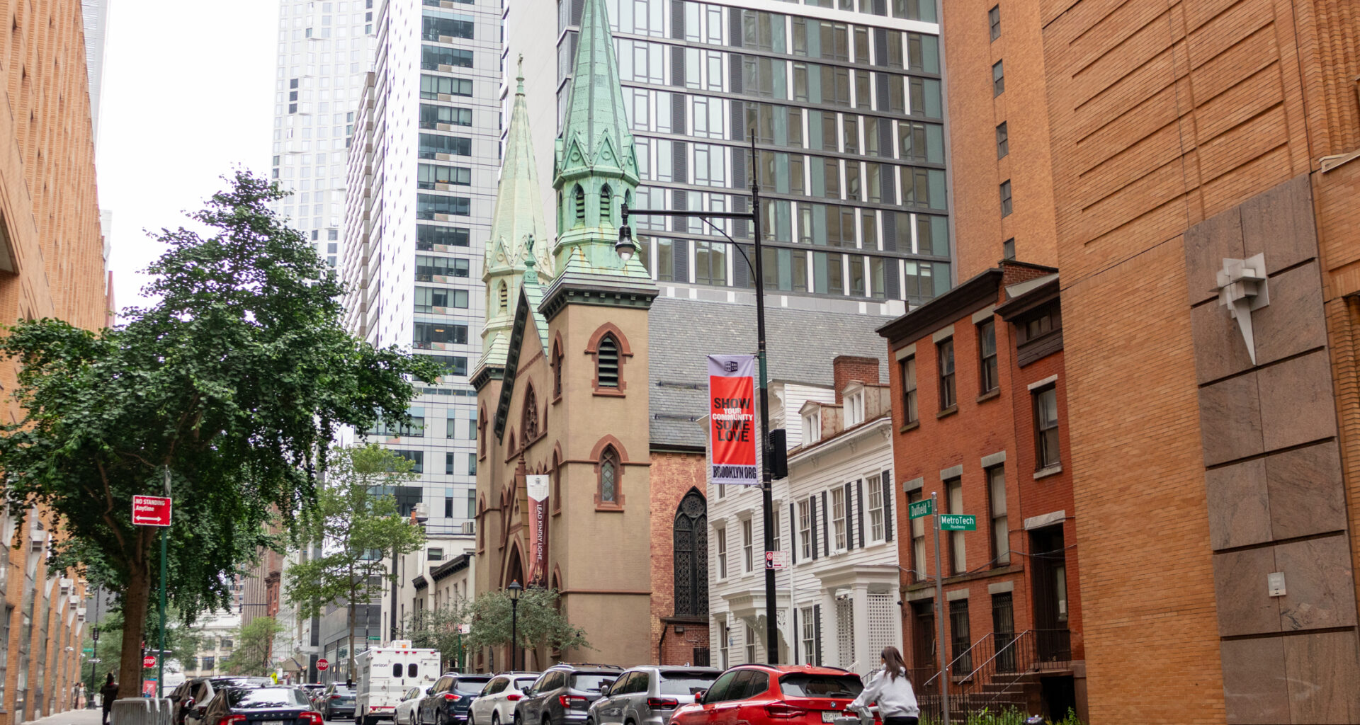 brooklyn - row of small houses and a church on duffield street