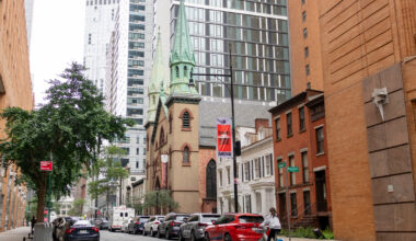 brooklyn - row of small houses and a church on duffield street