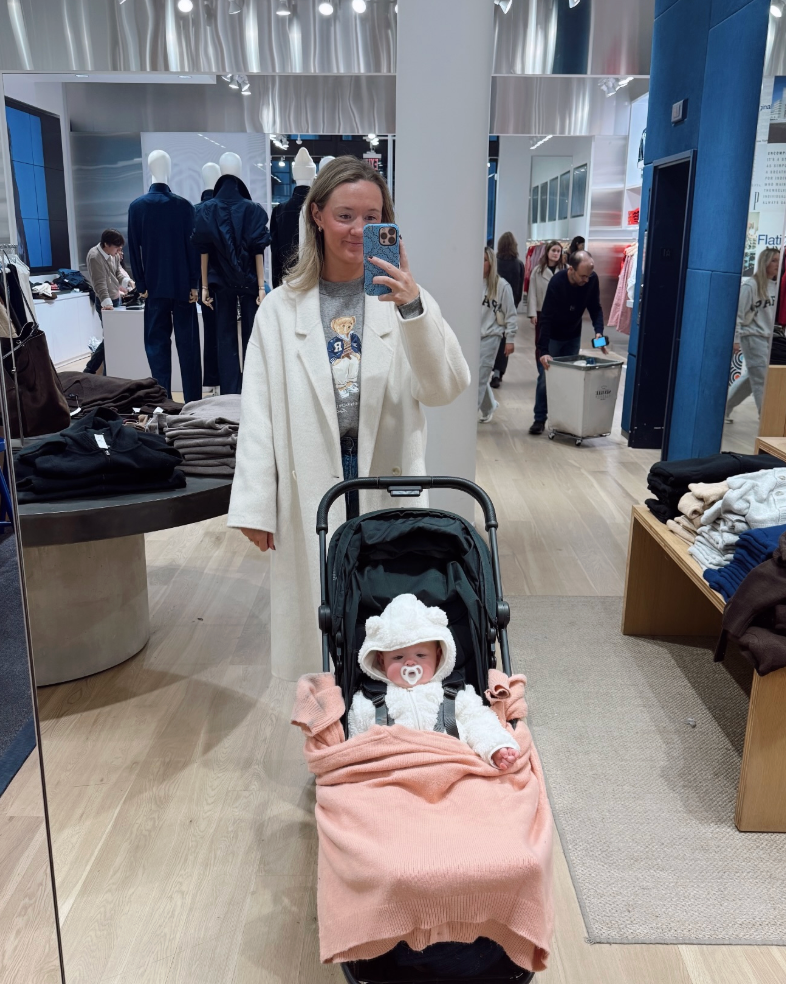 baby sofia in stroller while alex drummond shops in new york city