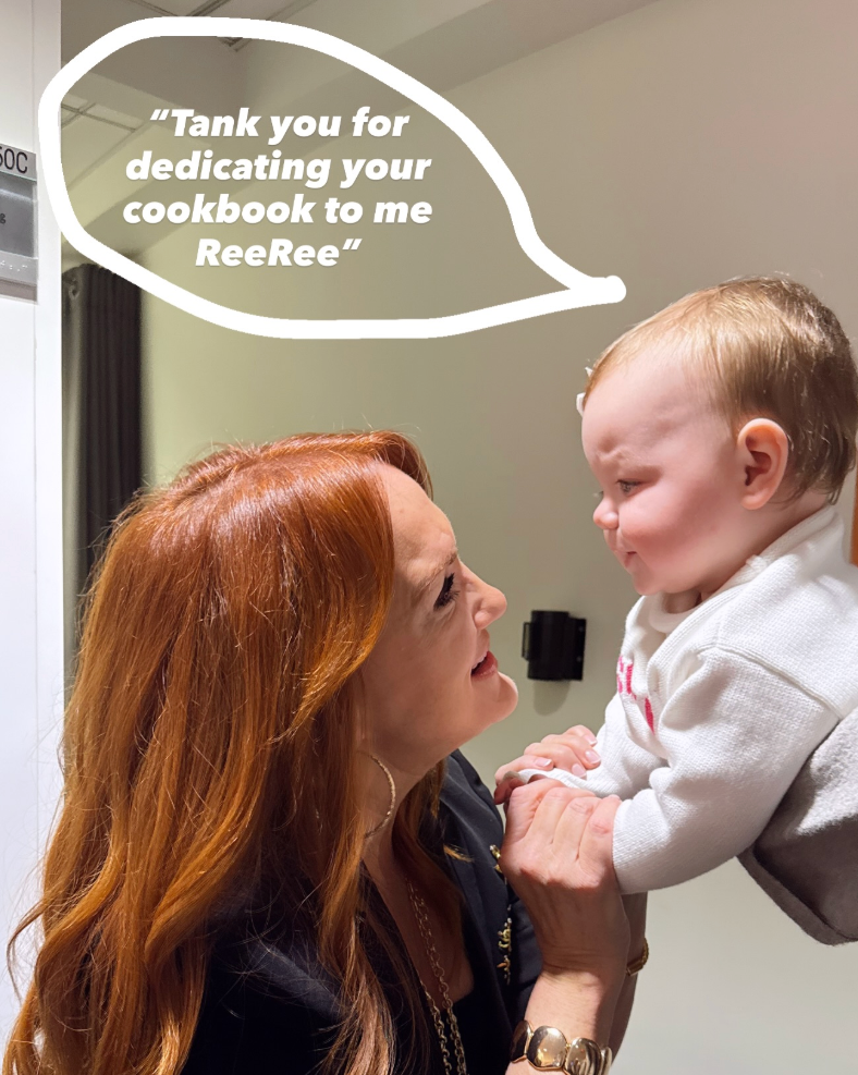 ree drummond holding sofia's hands