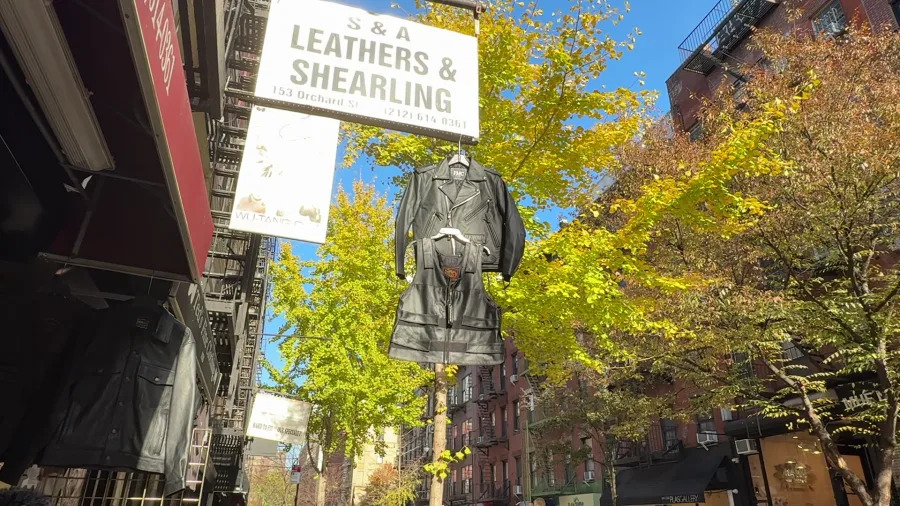 S&A Leathers & Shearling hangs clothing as many merchants did throughout the 20th century on Orchard Street. (Credit: PIX11)