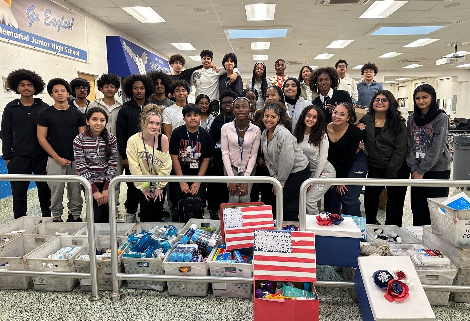 Students from the Youth Leadership Club worked together to package toiletries the night before the hand-off at Memorial Junior High School.