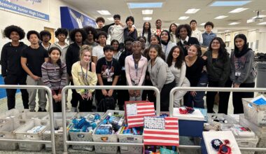 Students from the Youth Leadership Club worked together to package toiletries the night before the hand-off at Memorial Junior High School.