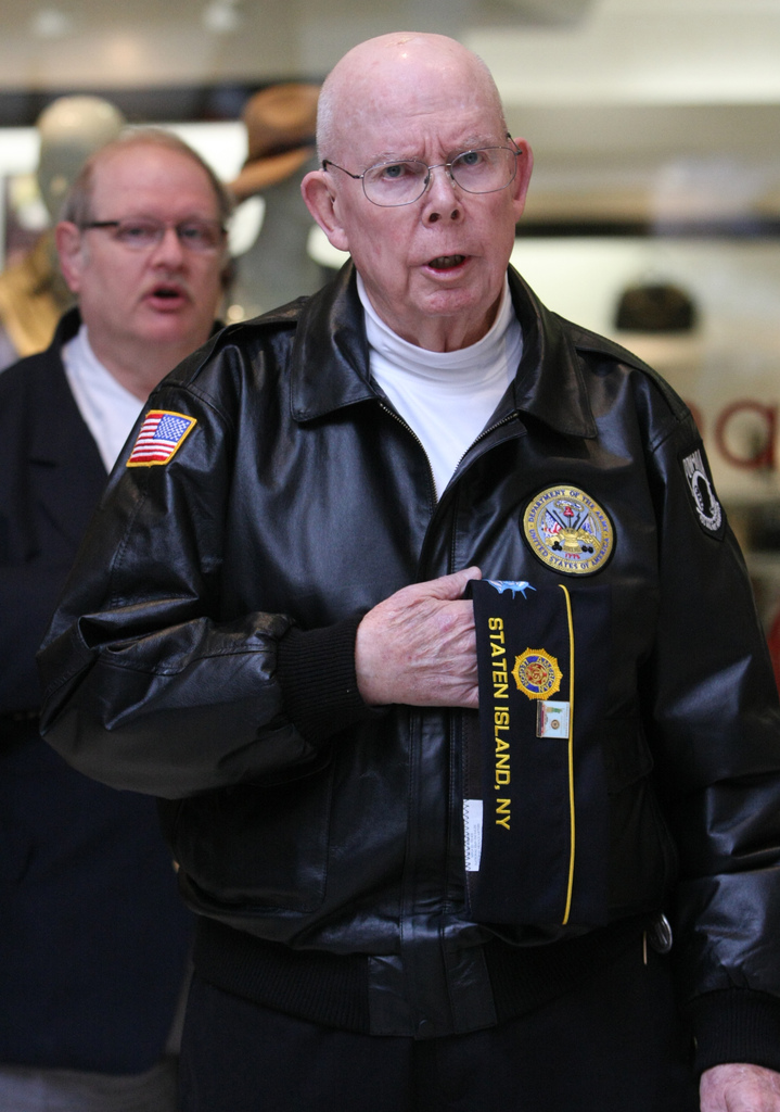 Opening with a prayer is William O'Brien, past district commander. The American Legion of Richmond County holds its annual Veterans Day Ceremony, center court at the Staten Island Mall. (Staten Island Advance/ Jan Somma-Hammel) Staff-Shot