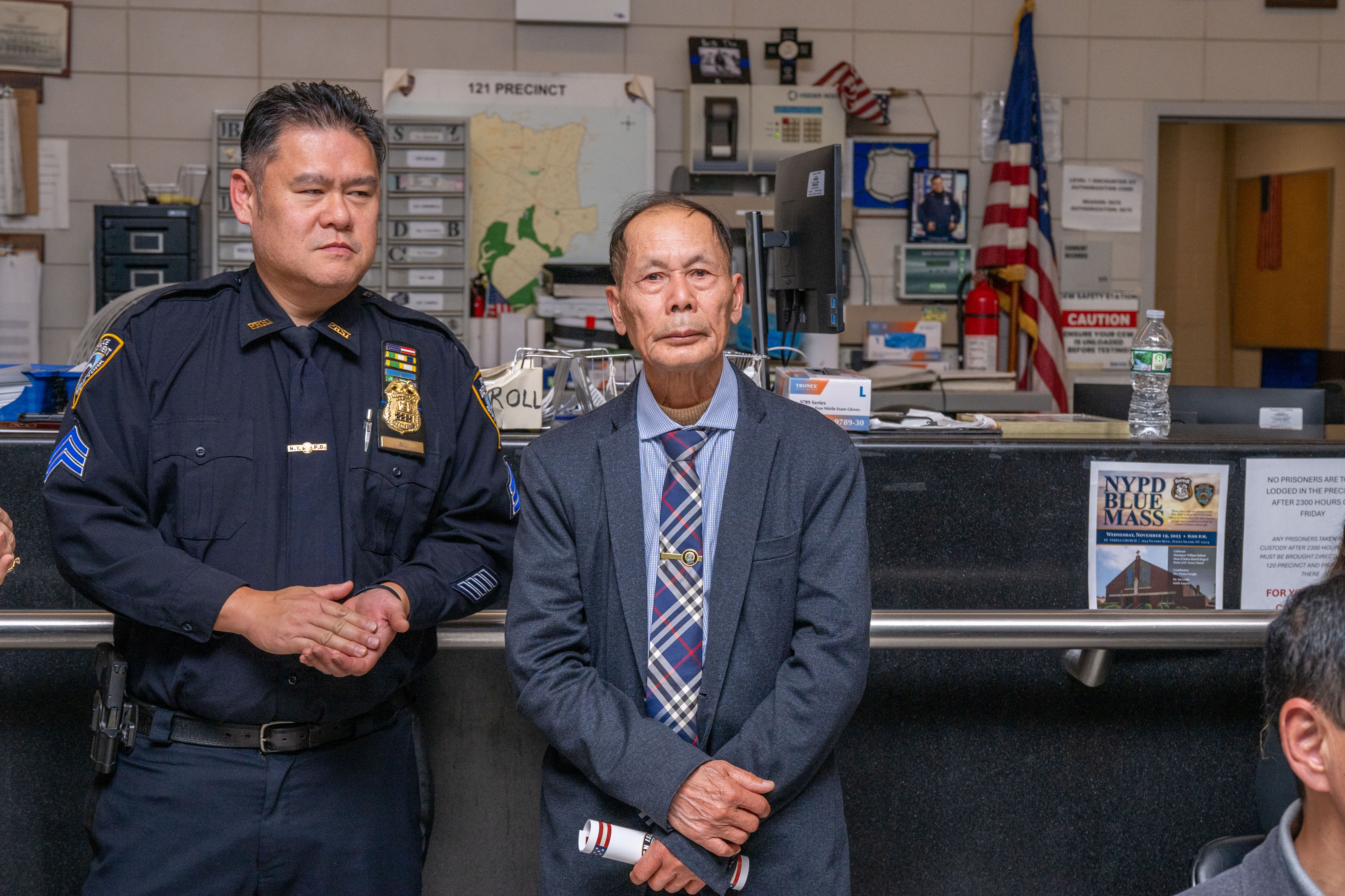 Wei Tang Liu, father of slain Detective Wenjian Liu, listens to speakers at the 121st Precinct on Saturday, November 15, 2025, in Graniteville for the 10th annual Staten Island Remembers, honoring fallen Staten Islanders who served in the New York Police Department. (Owen Reiter for the Advance/SILive.com)