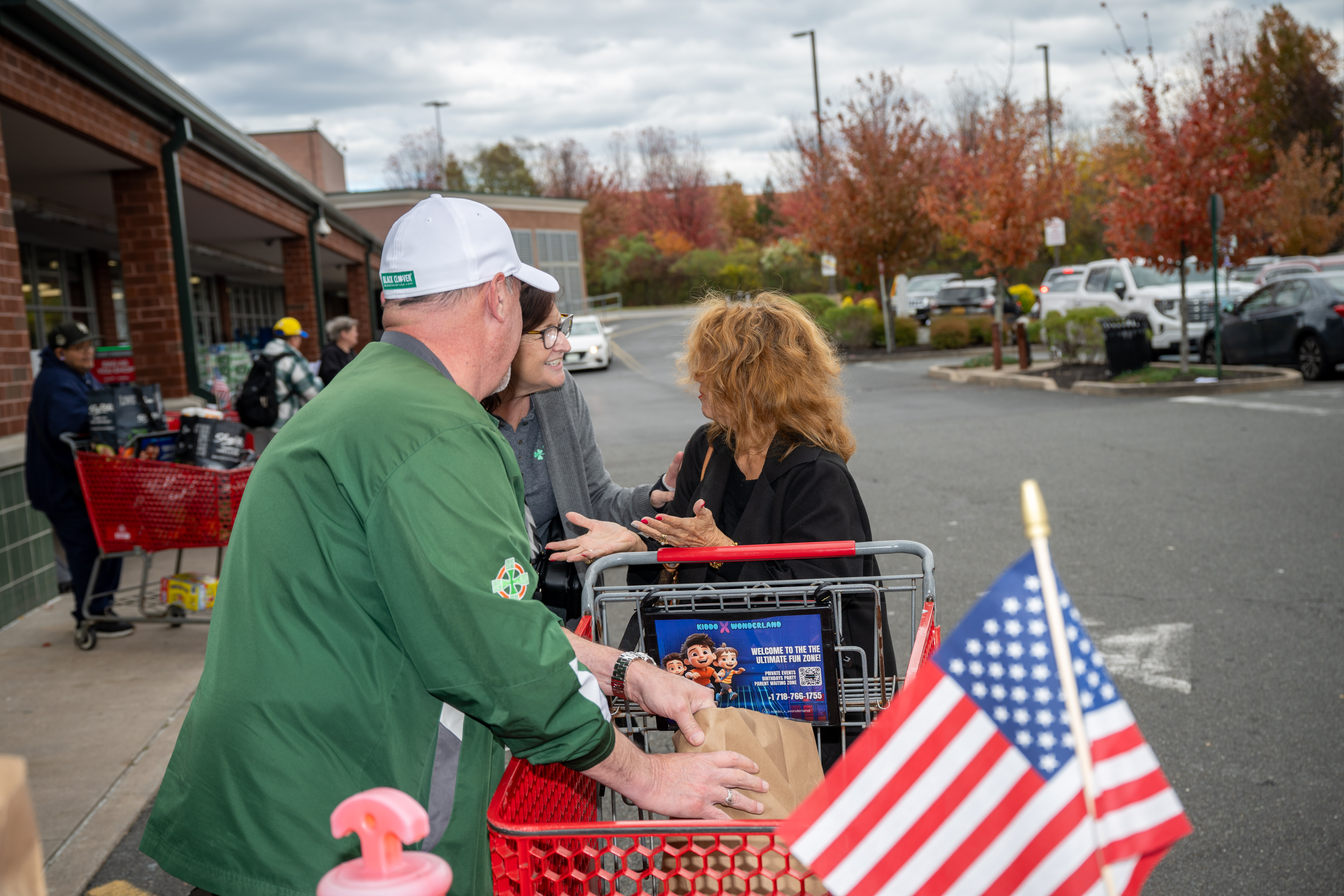 Elsie Sloman ((R) from Rossville donates food to the Ancient Order of Hibernians’ food drive for Blue Star Families on Saturday, November 1, 2025, in Charleston. The proceeds will benefit military families at Fort Wadsworth. (Owen Reiter for the Advance/SILive.com
