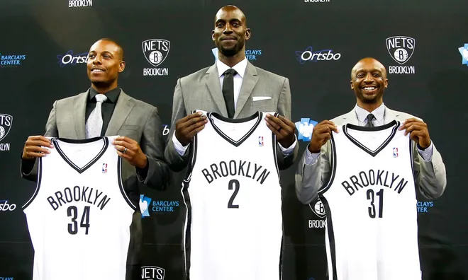 Jul 18, 2013; Brooklyn, NY, USA; From left Paul Pierce , Kevin Garnett and Jason Terry during a press conference to introduce them as the newest members of the Brooklyn Nets at Barclays Center. Mandatory Credit: Debby Wong-USA TODAY Sports ORG XMIT: USATSI-136542 ORIG FILE ID: 20130718_jla_aw8_372.jpg