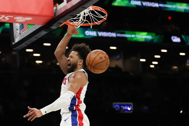 Detroit Pistons guard Cade Cunningham (2) dunks the ball during the second half of an NBA Cup basketball game against the Brooklyn Nets, Friday, Nov. 7, 2025, in New York. (AP Photo/Heather Khalifa)