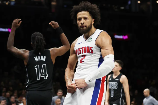 Detroit Pistons guard Cade Cunningham (2) reacts after scoring a basket and drawing a foul during the second half of an NBA Cup basketball game against the Brooklyn Nets, Friday, Nov. 7, 2025, in New York. (AP Photo/Heather Khalifa)