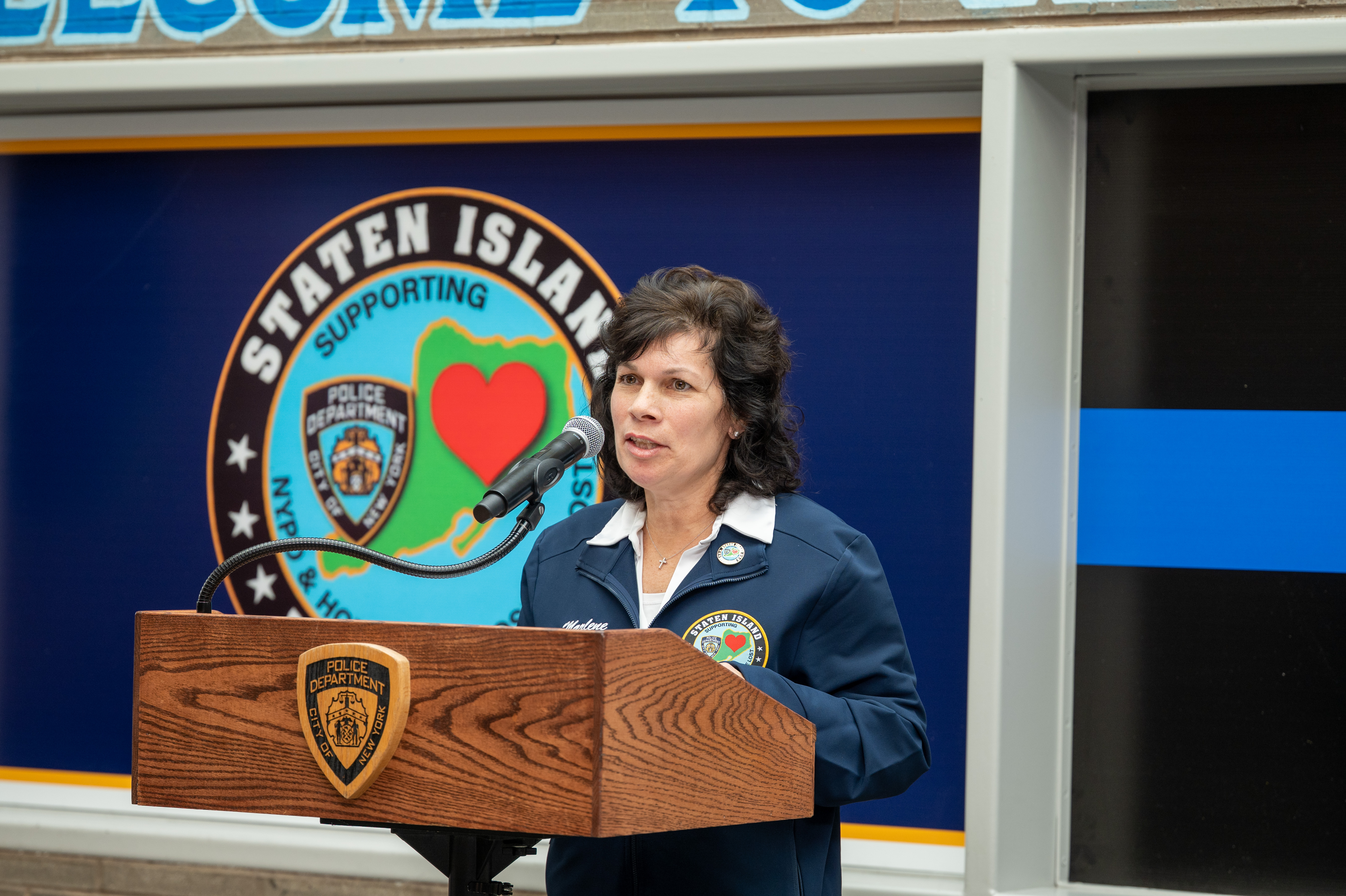 Co-chair Marlene Markoe-Boyd speaks at the 121st Precinct on Saturday, November 15, 2025, in Graniteville, for the 10th annual Staten Island Remembers, honoring fallen Staten Islanders who served in the New York Police Department. (Owen Reiter for the Advance/SILive.com)