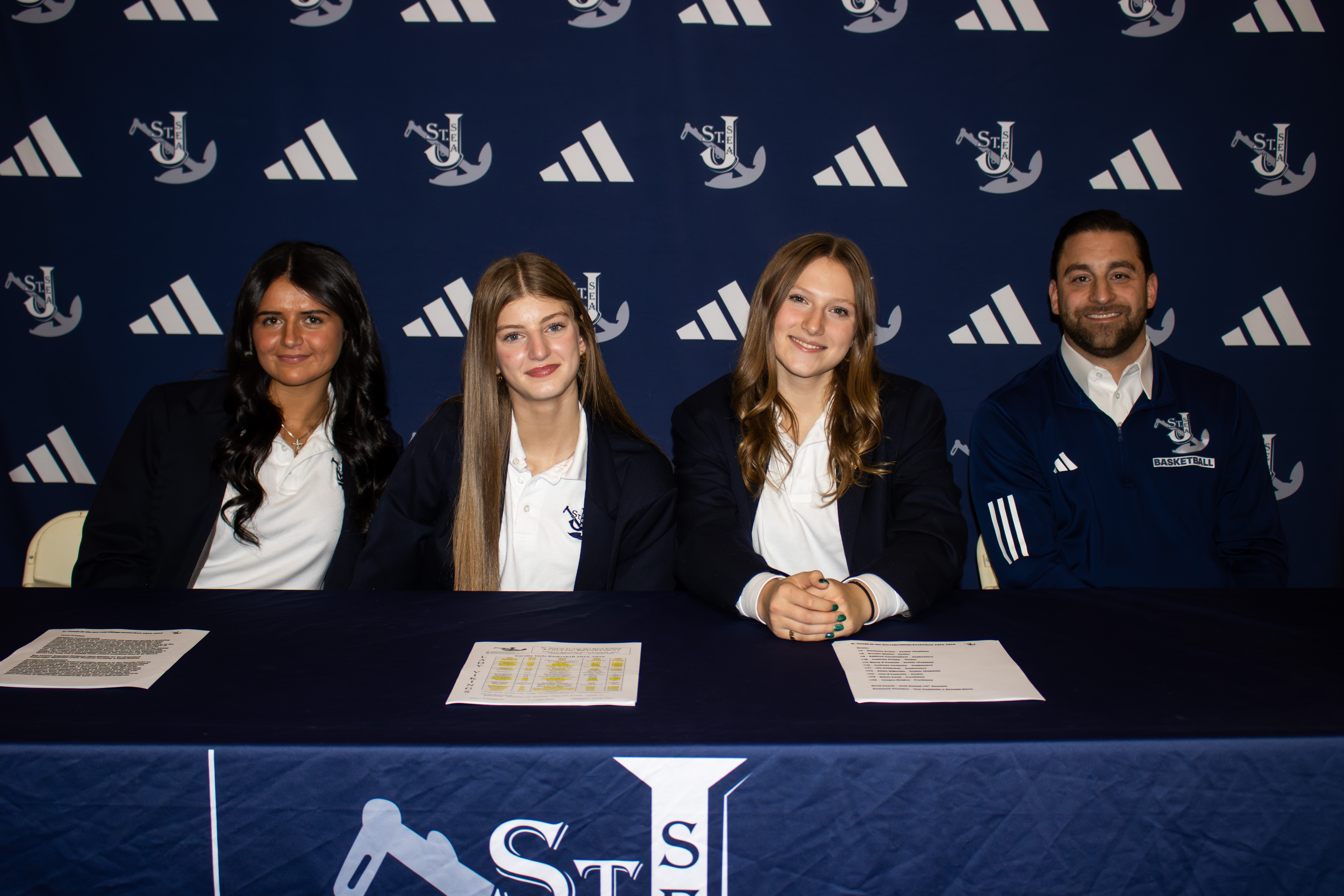 All four Staten Island CHSAA schools, alongside 26 other teams across the league, took part in the second annual event at Christ the King Monday evening. From left to right, St. Joseph by-the-Sea was represented by Olivia DiMonda, Giovanna Grima, Maria O'Connell and head coach Josh Suslak. (Annie DeBiase for the Advance/SILive.com)