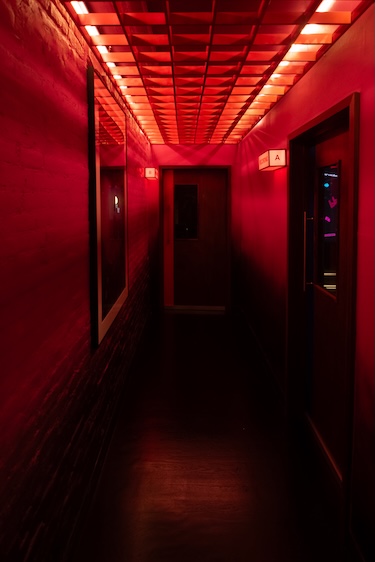 beatbox karaoke venue lounge red light hallway