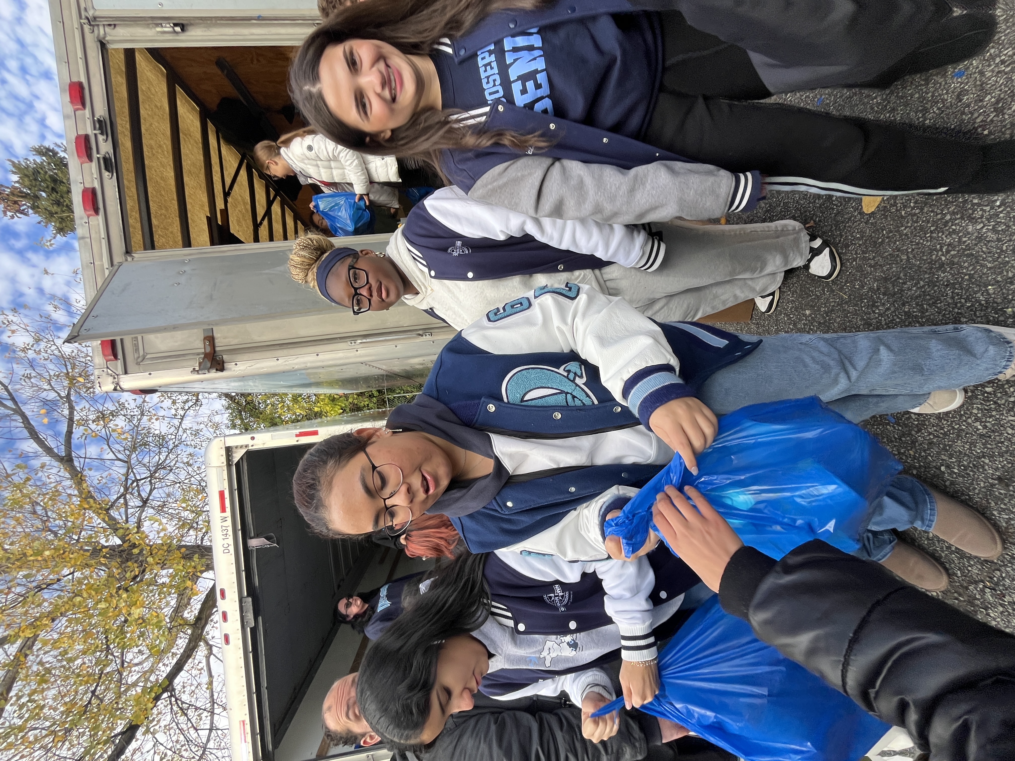 Students volunteer their time ahead of the annual Project Hospitality Poor People's Dinner, which is on Monday, to sort food donations and feed the hungry. (Advance/SILive.com | Jan Somma-Hammel)