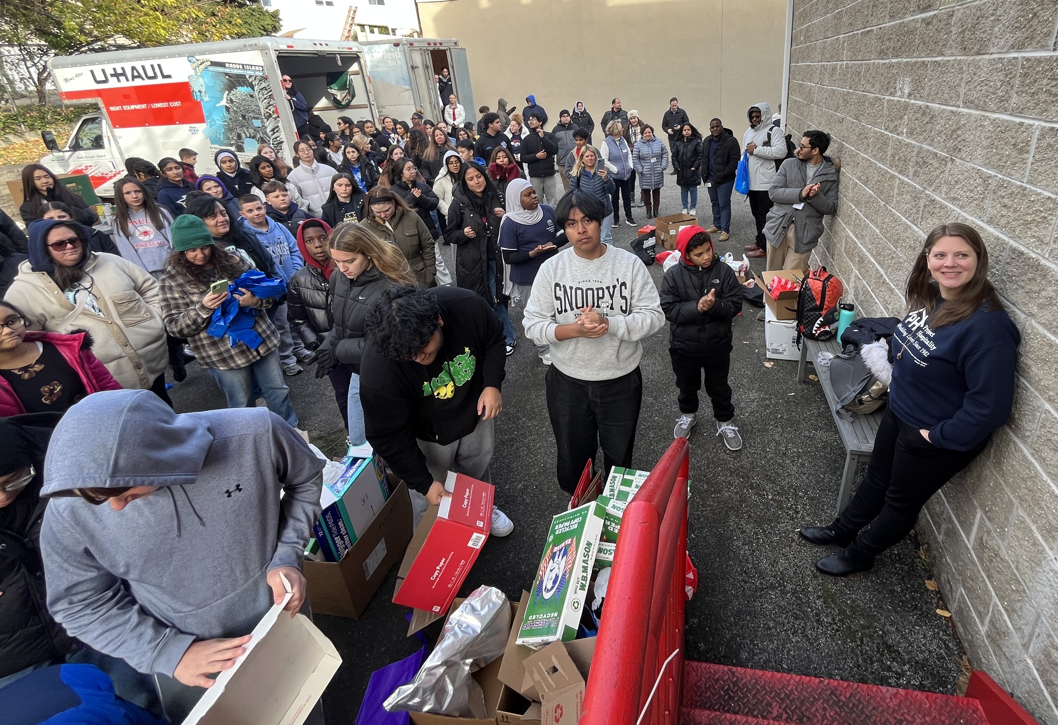 Students volunteer their time ahead of the annual Project Hospitality Poor People's Dinner, which is on Monday to sort food donations and feed the hungry. (Advance/SILive.com | Jan Somma-Hammel)