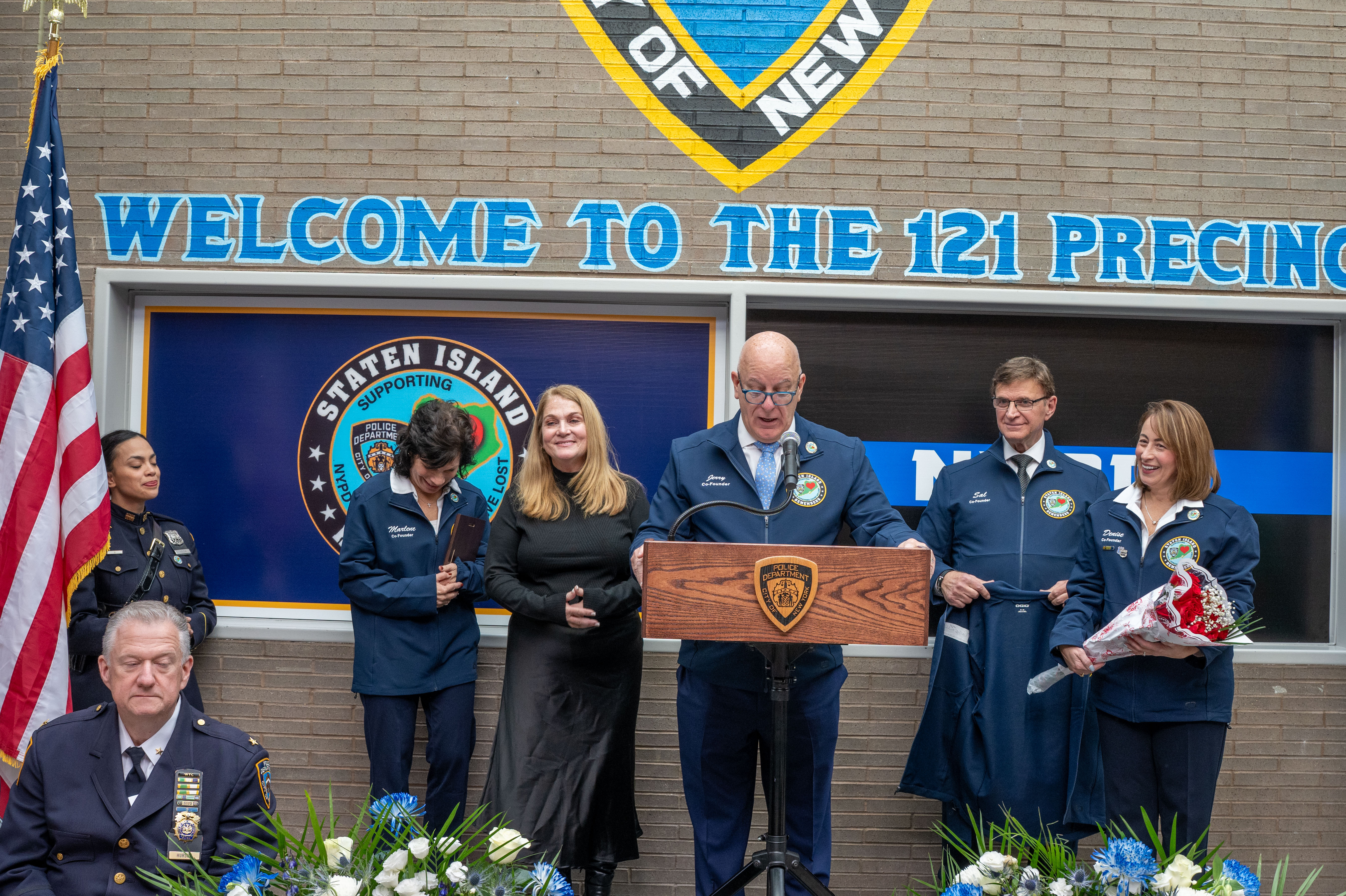 Friends, family, community leaders, elected officials, and fellow NYPD members gather at the 121st Precinct on Saturday, November 15, 2025, in Graniteville for the 10th annual Staten Island Remembers, honoring fallen Staten Islanders who served in the New York Police Department. (Owen Reiter for the Advance/SILive.com)