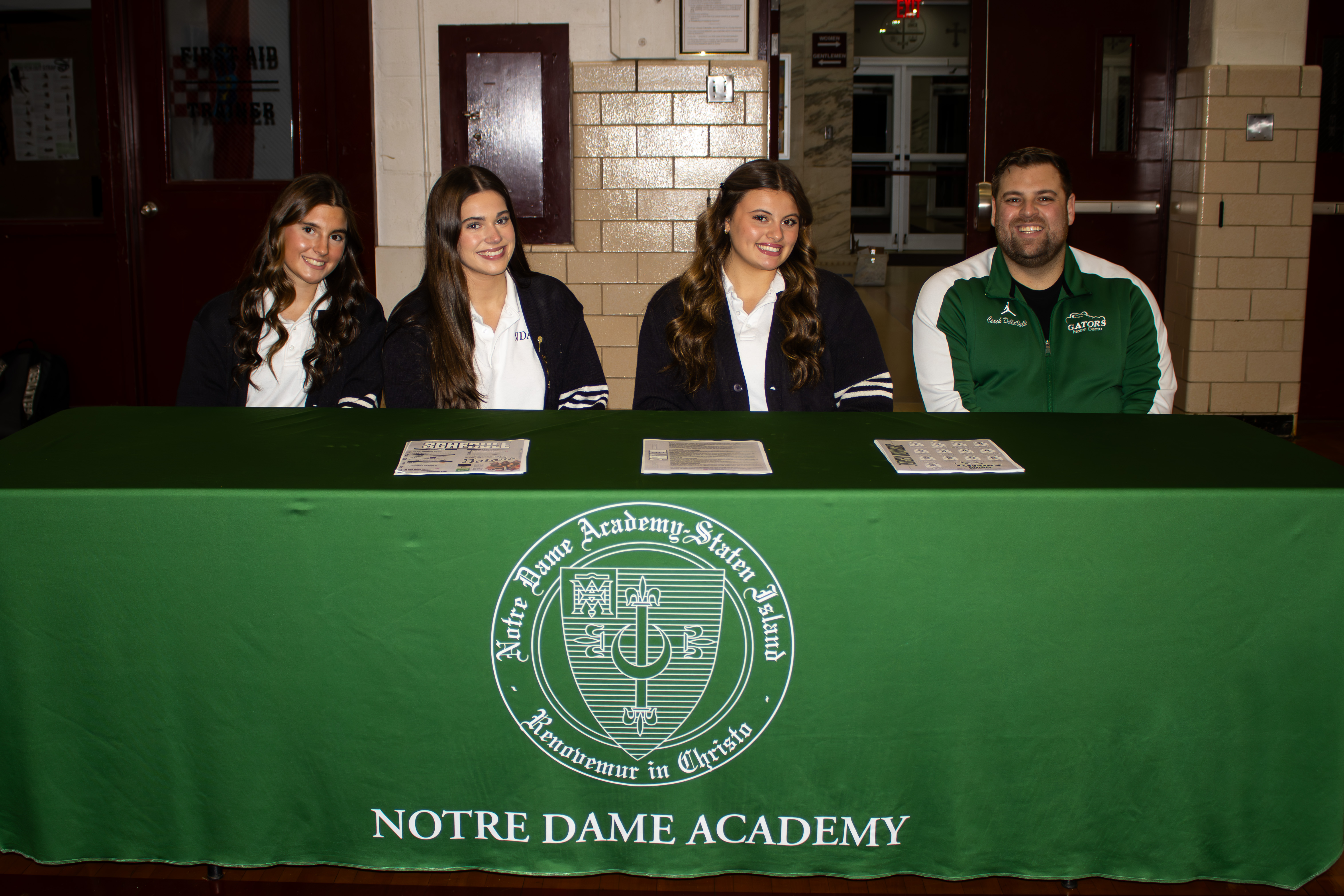 All four Staten Island CHSAA schools, alongside 26 other teams across the league, took part in the second annual event at Christ the King Monday evening. From left to right, Notre Dame Academy was represented by Gianna Montagna, Ava Manzella, Caroline Kasagrande and head coach Bobby DellaValle. (Annie DeBiase for the Advance/SILive.com)