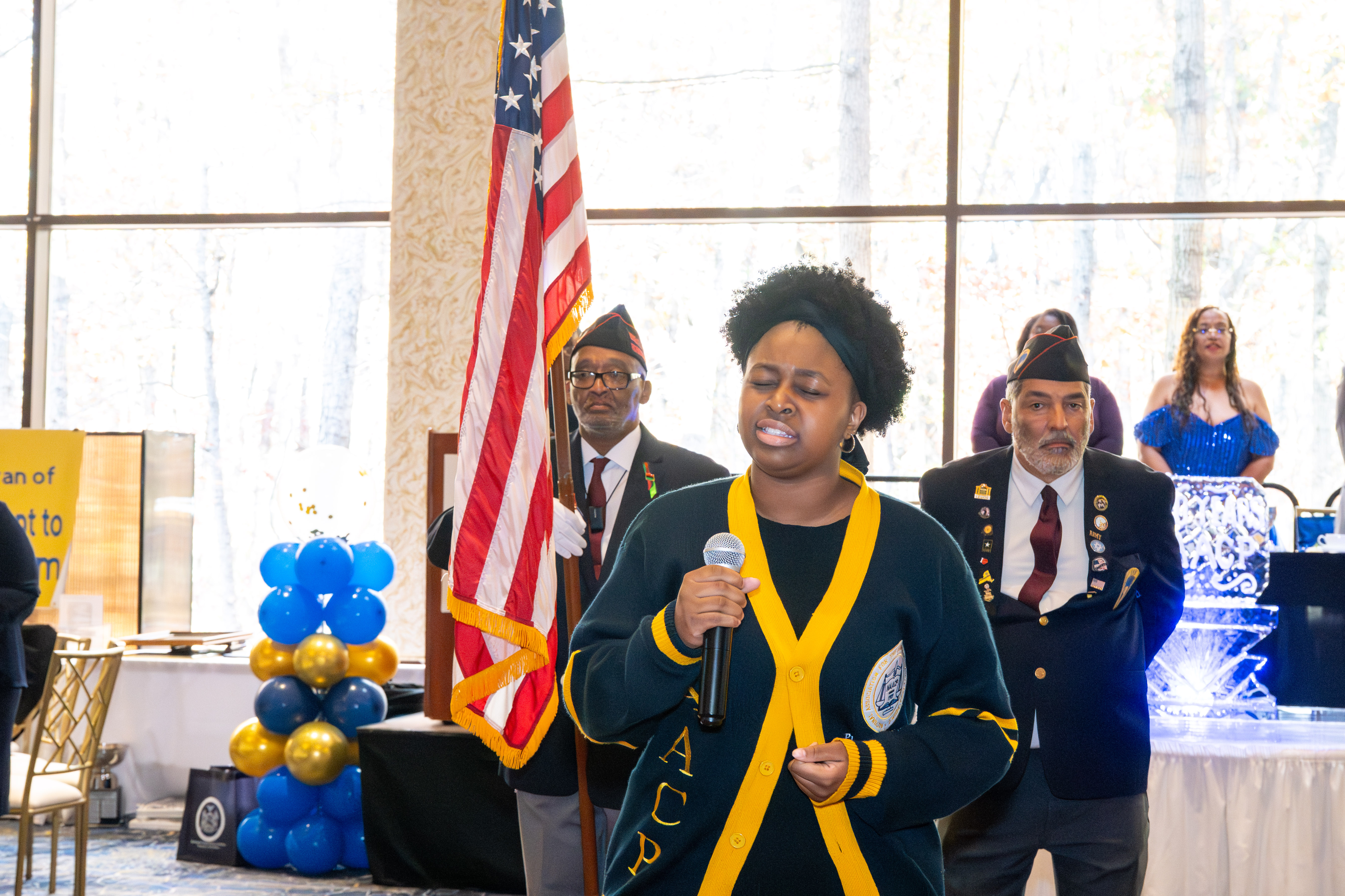 Xzayla Wilson, 16, sings the Negro National Anthem at the Staten Island NAACP’s Freedom Fund Luncheon held at Nicotra’s Ballroom at the Hilton Garden Inn on Saturday, November 8, 2025, in Bloomfield. The milestone event marked 100 years of service to the community. (Owen Reiter for the Advance/SILive.com)