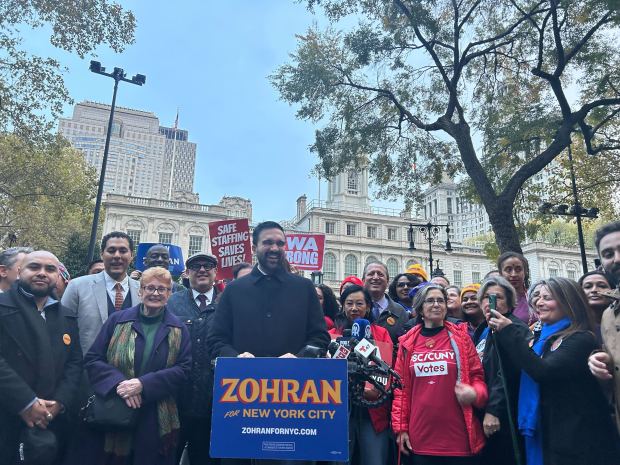 Zohran Mamdani addresses supporters at a rally outside City Hall.
