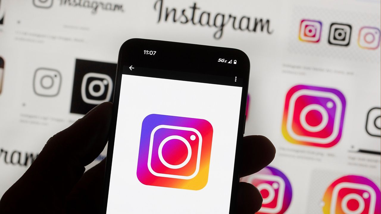 The Instagram logo is seen on a cell phone
