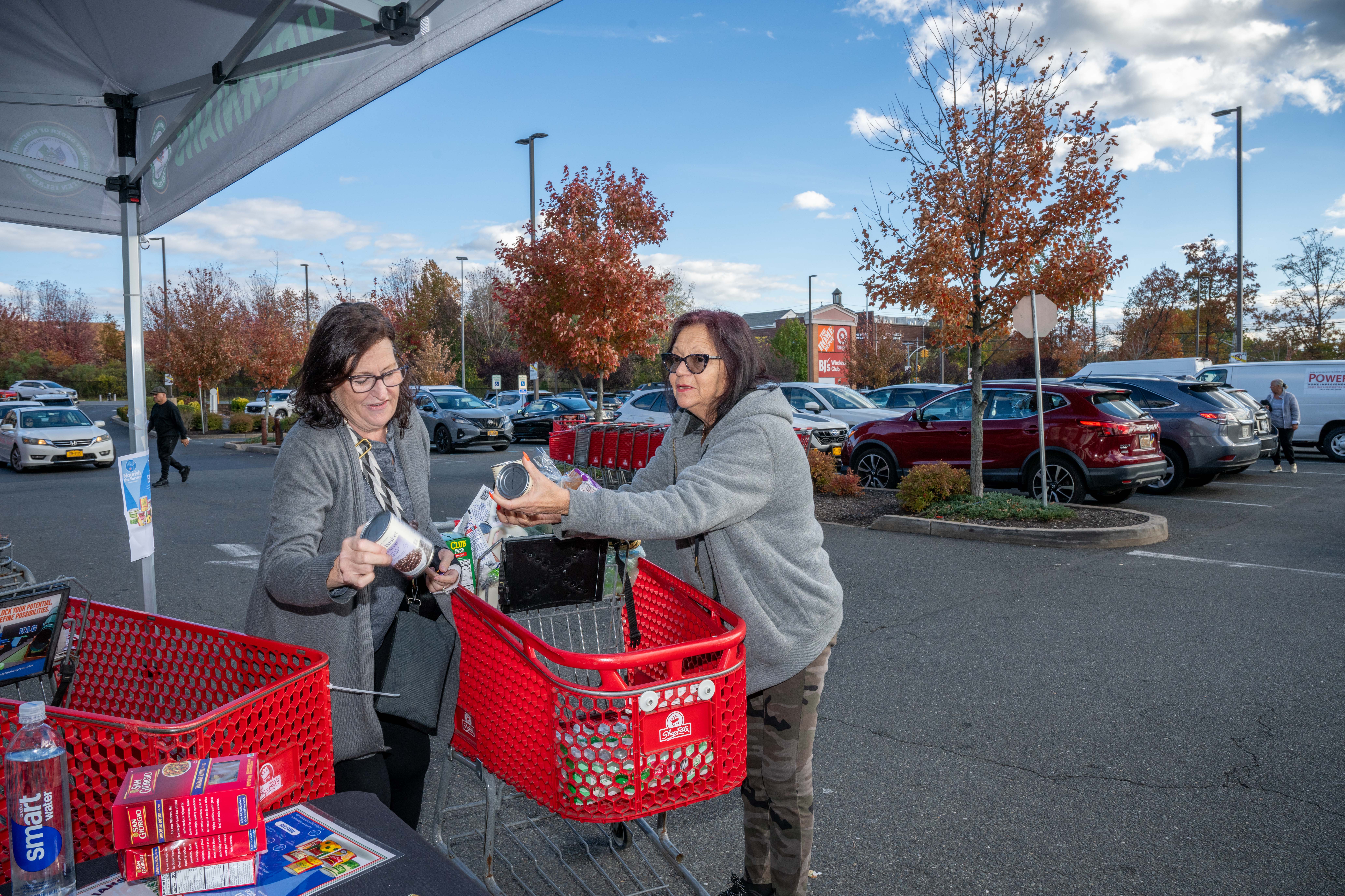 Hundreds of people donate food and/or money to the Ancient Order of Hibernians’ food drive for Blue Star Families on Saturday, November 1, 2025, in Charleston. The proceeds will benefit military families at Fort Wadsworth. (Owen Reiter for the Advance/SILive.com)